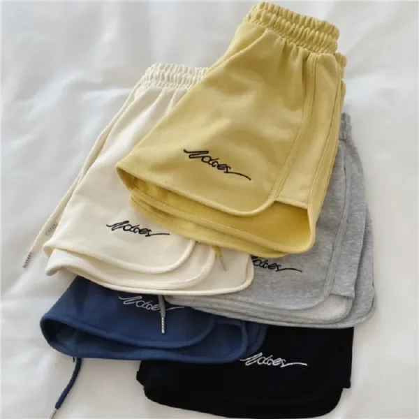 Pantaloncini sportivi da donna larghi a vita alta estivi comodi e traspiranti per yoga e attività all'aperto